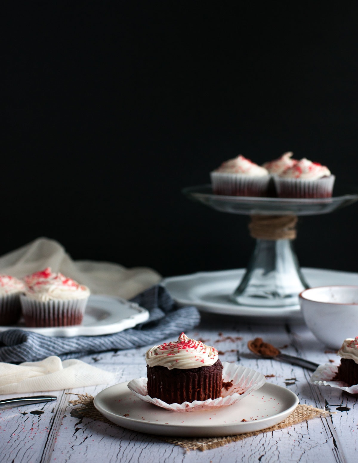 Healthy yet tasty beet red velvet cupcakes are made with whole wheat flour and no processed sugar. They're topped off with a decadent cream cheese frosting.