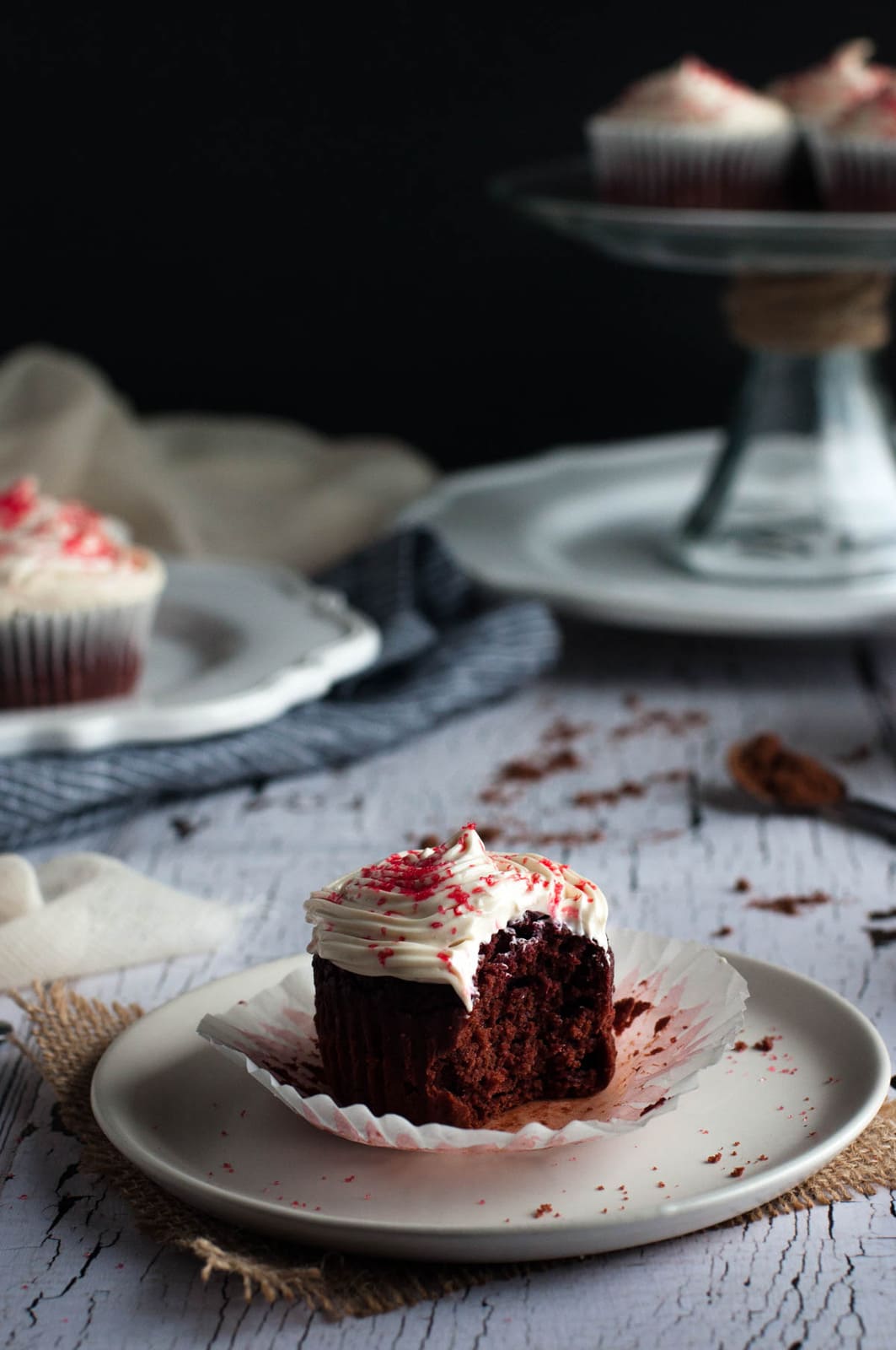 Healthy yet tasty beet red velvet cupcakes are made with whole wheat flour and no processed sugar. They're topped off with a decadent cream cheese frosting.