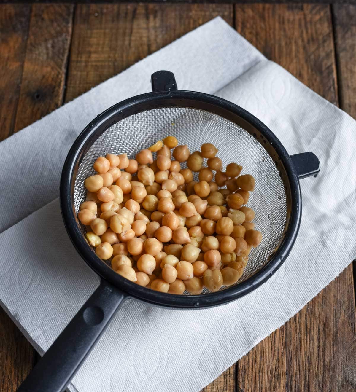 These spicy roasted chickpeas are a tasty and satisfying savory high protein snack with over 6 grams of protein in each delicious serving. 