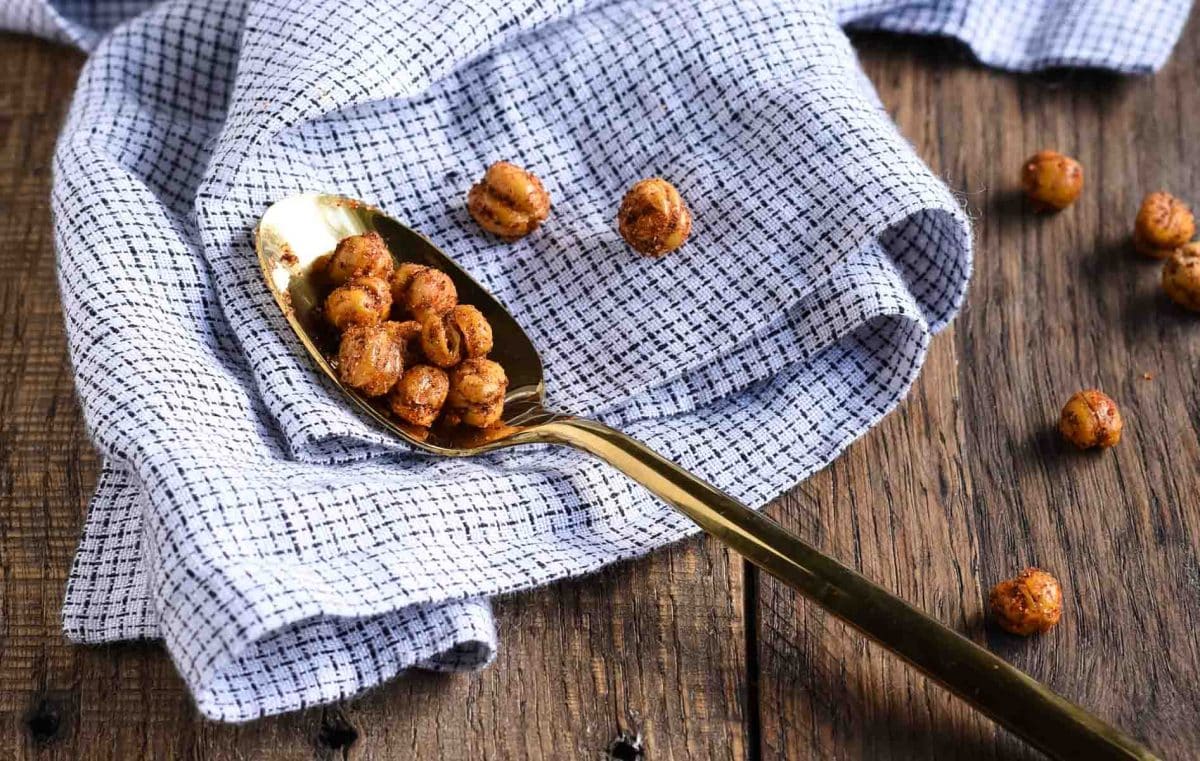 These spicy roasted chickpeas are a tasty and satisfying savory high protein snack with over 6 grams of protein in each delicious serving. 