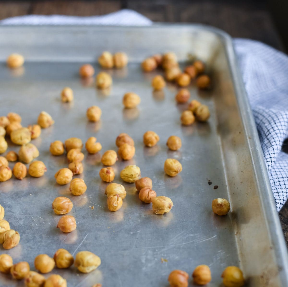 These spicy roasted chickpeas are a tasty and satisfying savory high protein snack with over 6 grams of protein in each delicious serving. 