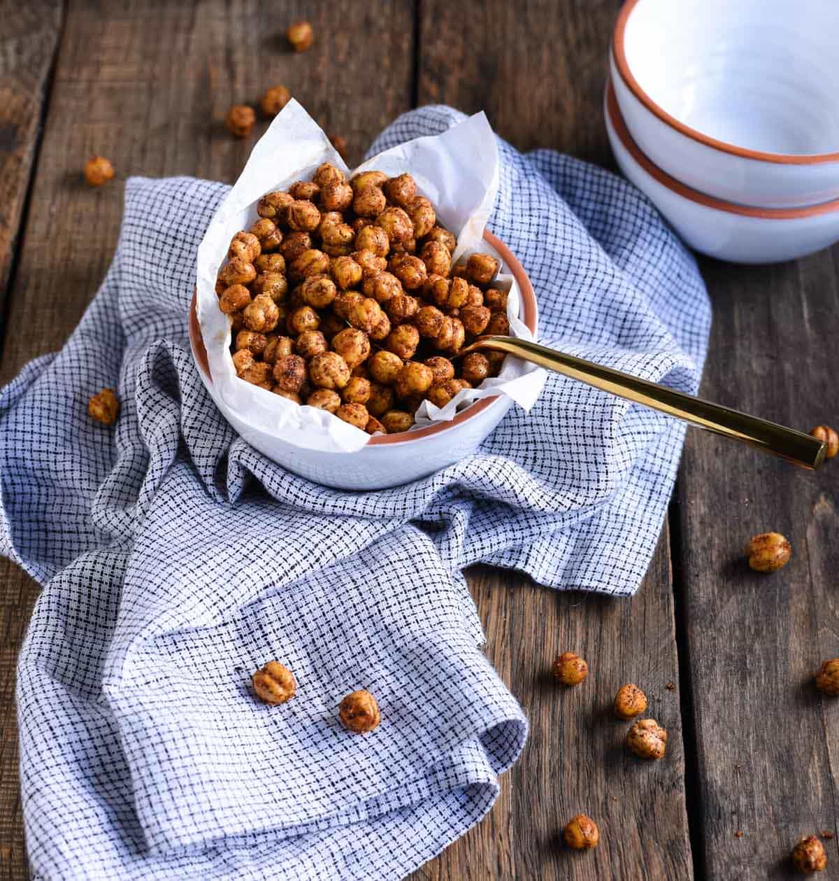 These spicy roasted chickpeas are a tasty and satisfying savory high protein snack with over 6 grams of protein in each delicious serving. 