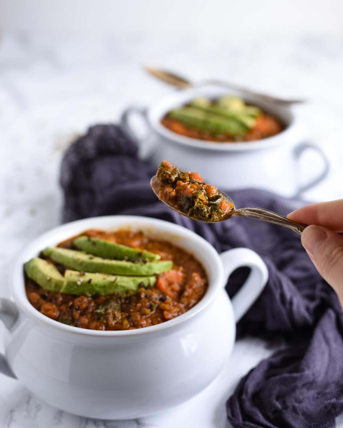 Curry lentil soup bite in spoon