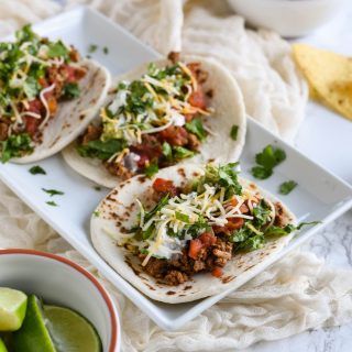 Healthy turkey tacos recipe that's loaded with peppers, spices and comes together in half hour or less! We eat this all the time - its simply the best!