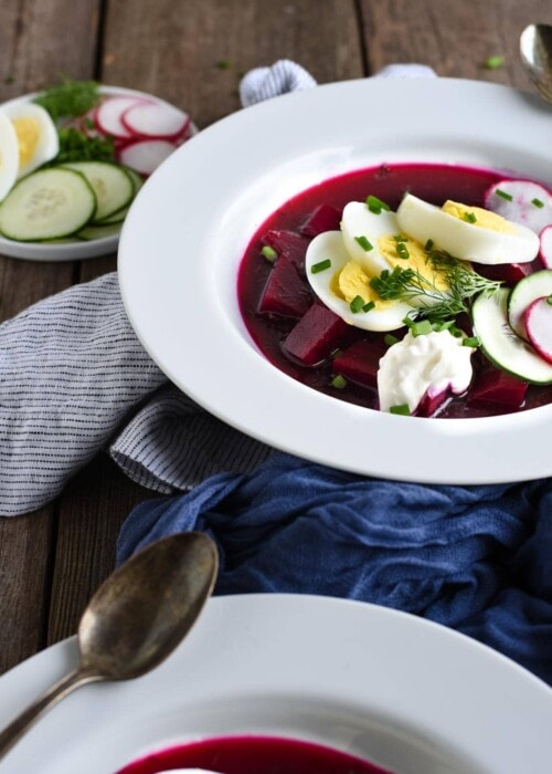 cold borscht with sour cream, boiled egg, and dill
