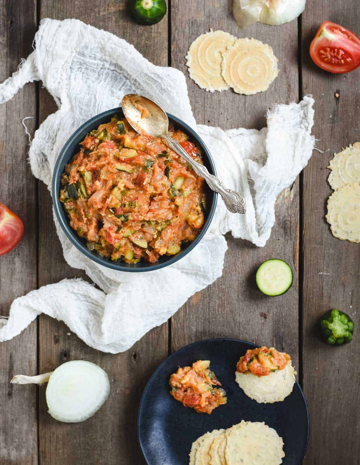 overhead picture of ikra dip in a bowl on a dark wood background