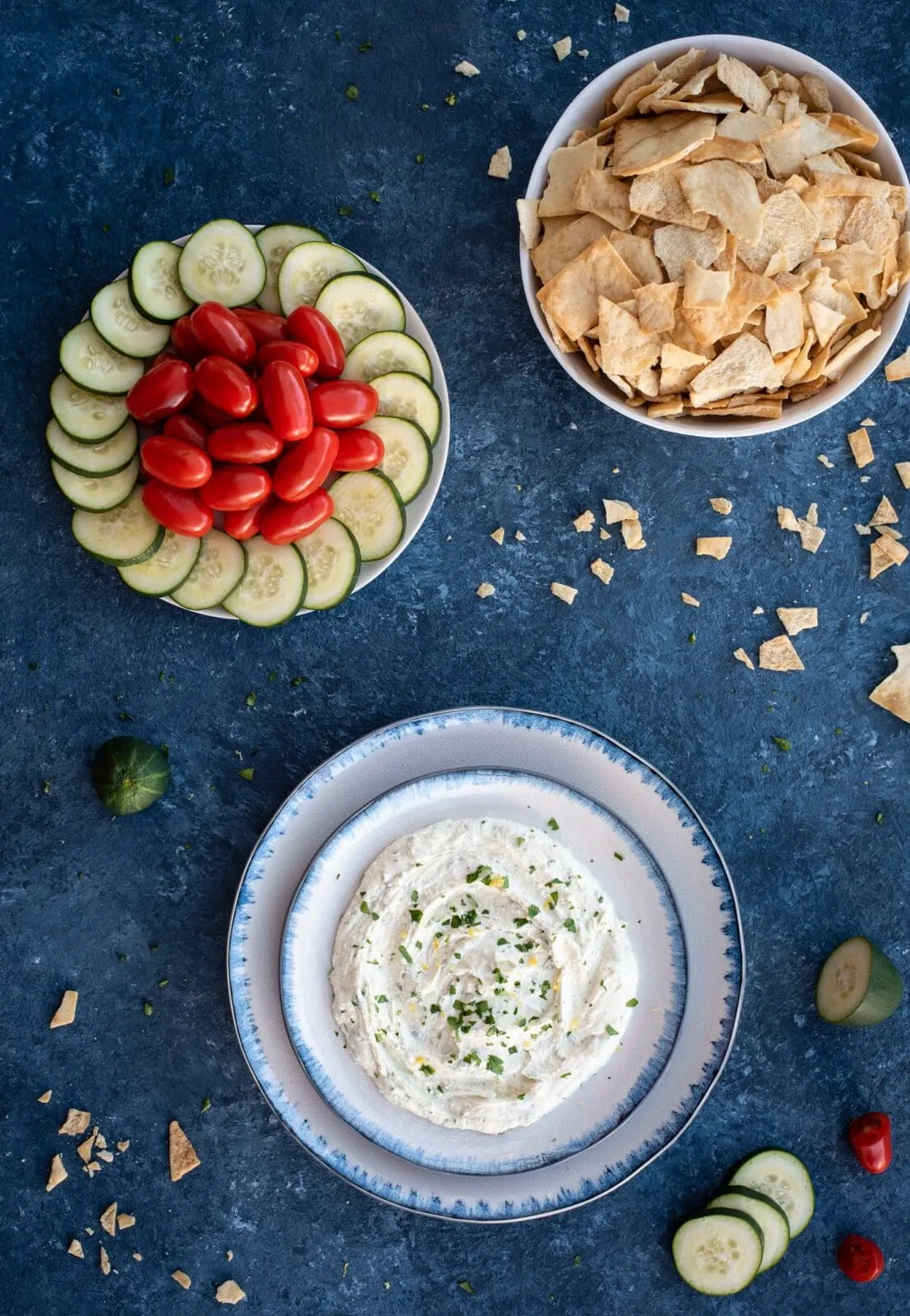 Picture of whipped feta with herbs, crackers, and vegetables