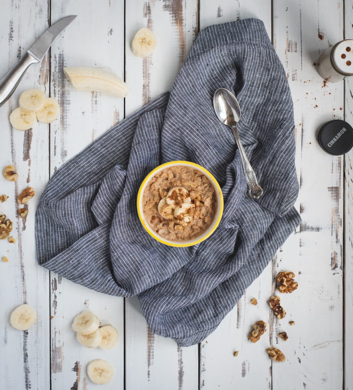 breakfast bowl of peanut butter banana oatmeal overhead picture 