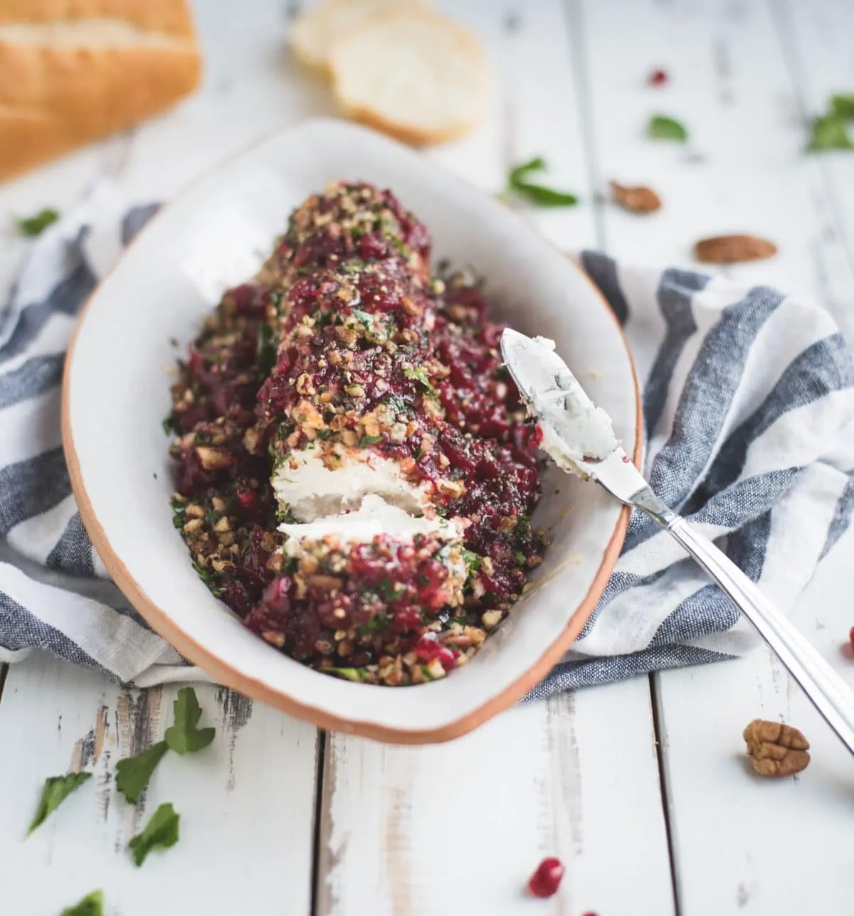 Photo of sliced cranberry herb goat cheese log