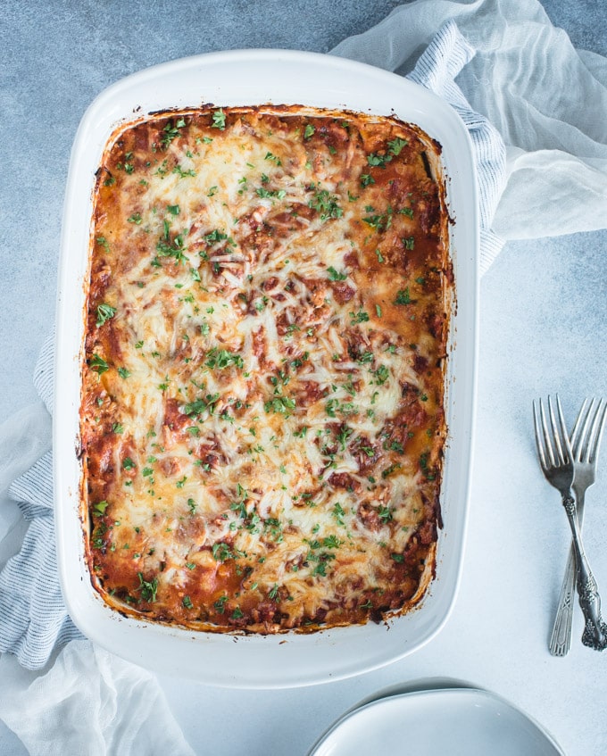 overhead picture of zucchini lasagna in a white dish