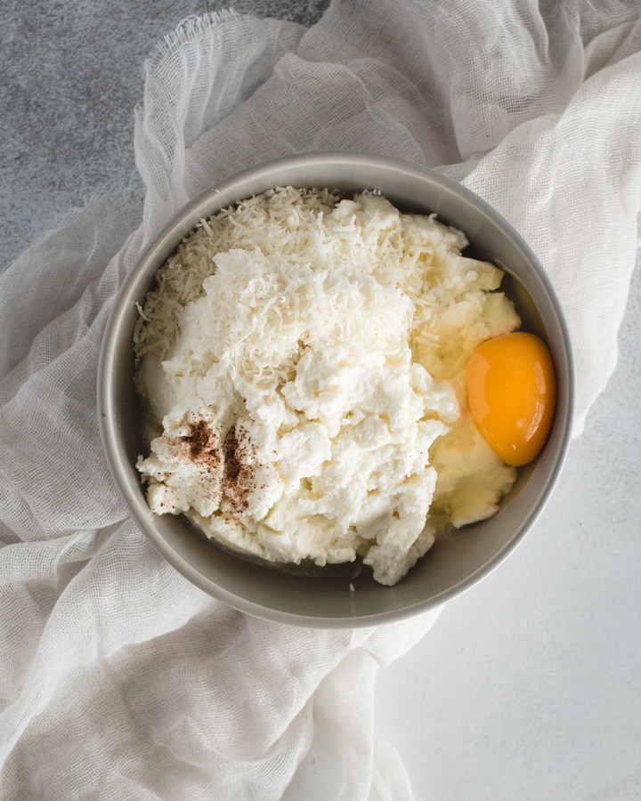 bowl with ricotta, egg, and nutmeg