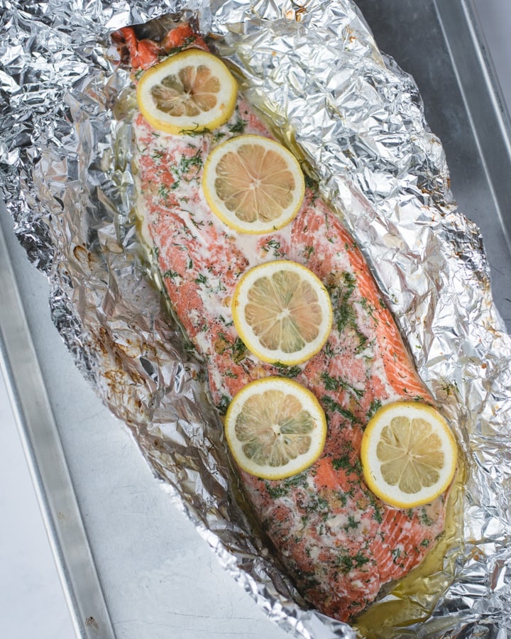 oven baked salmon with lemon and dill in tin foil