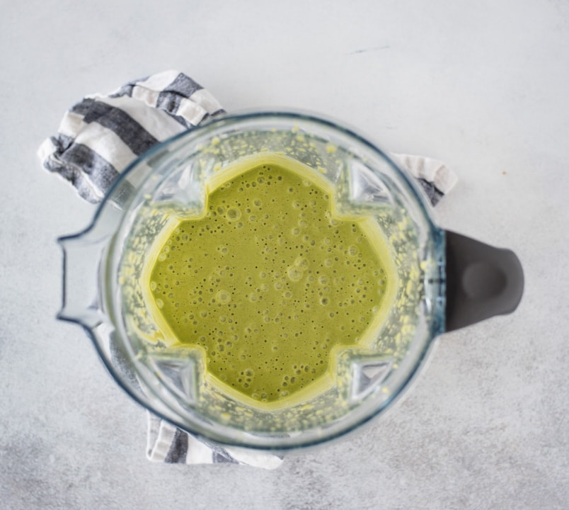 blender with green pancake batter