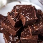 Stack of squares of fudge topped with sea salt