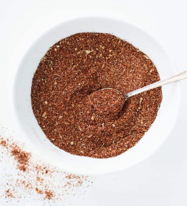 close up overhead picture of chicken taco seasoning blend on white background