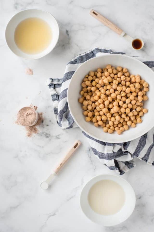 chocolate hummus ingredients laid out on a white background