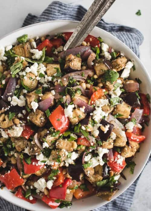 overhead picture of Mediterranean eggplant salad in a white bowl