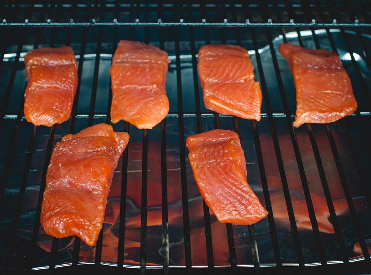 salmon being smoked on a Traeger grill