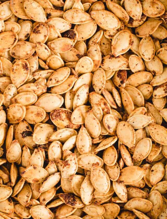 macro up close image of seasoned pumpkin seeds