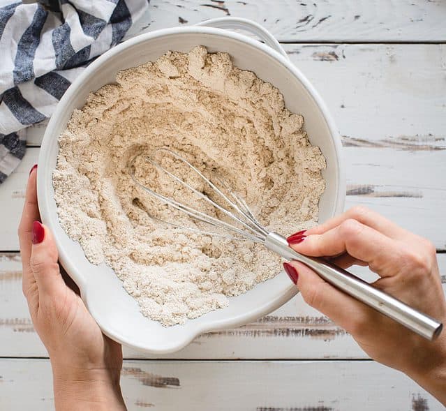 Hand stirring flour