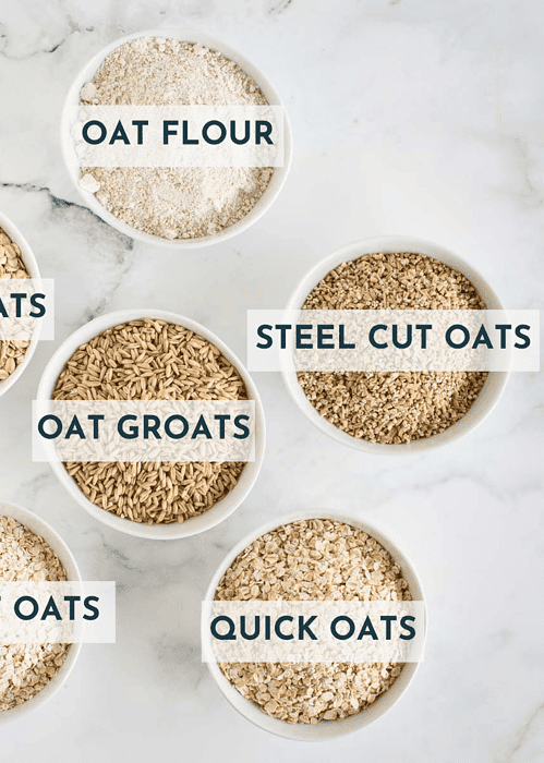 different types of oats in labeled bowls