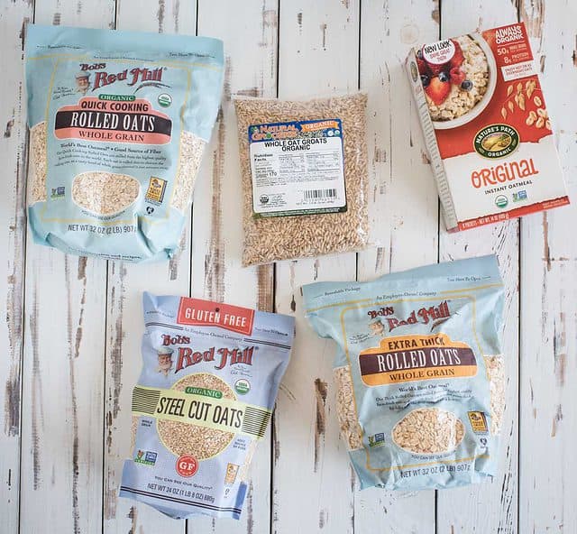 overhead of bags of different types of oats in store packaging 