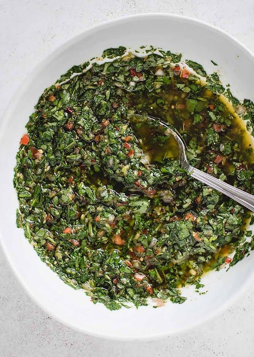 chimichurri from overhead in a large white bowl