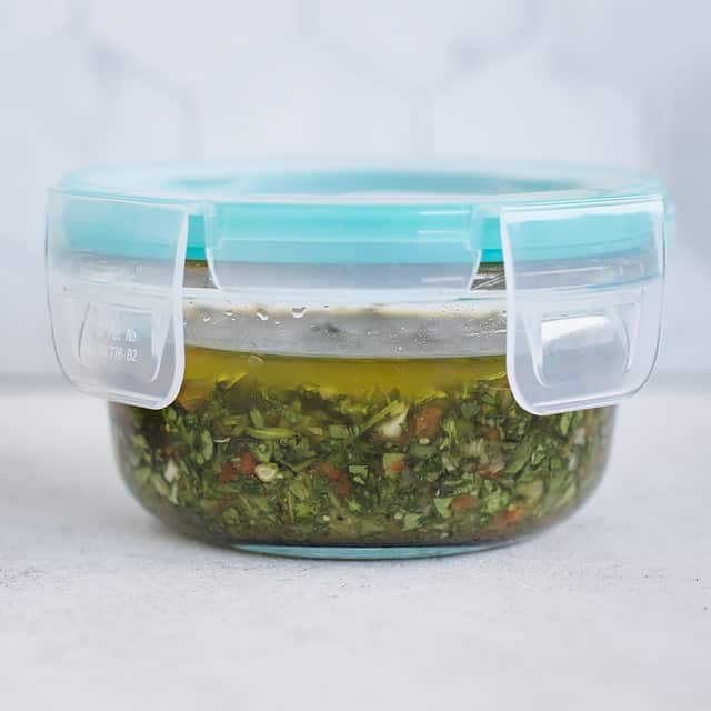 fresh herb sauce in a jar