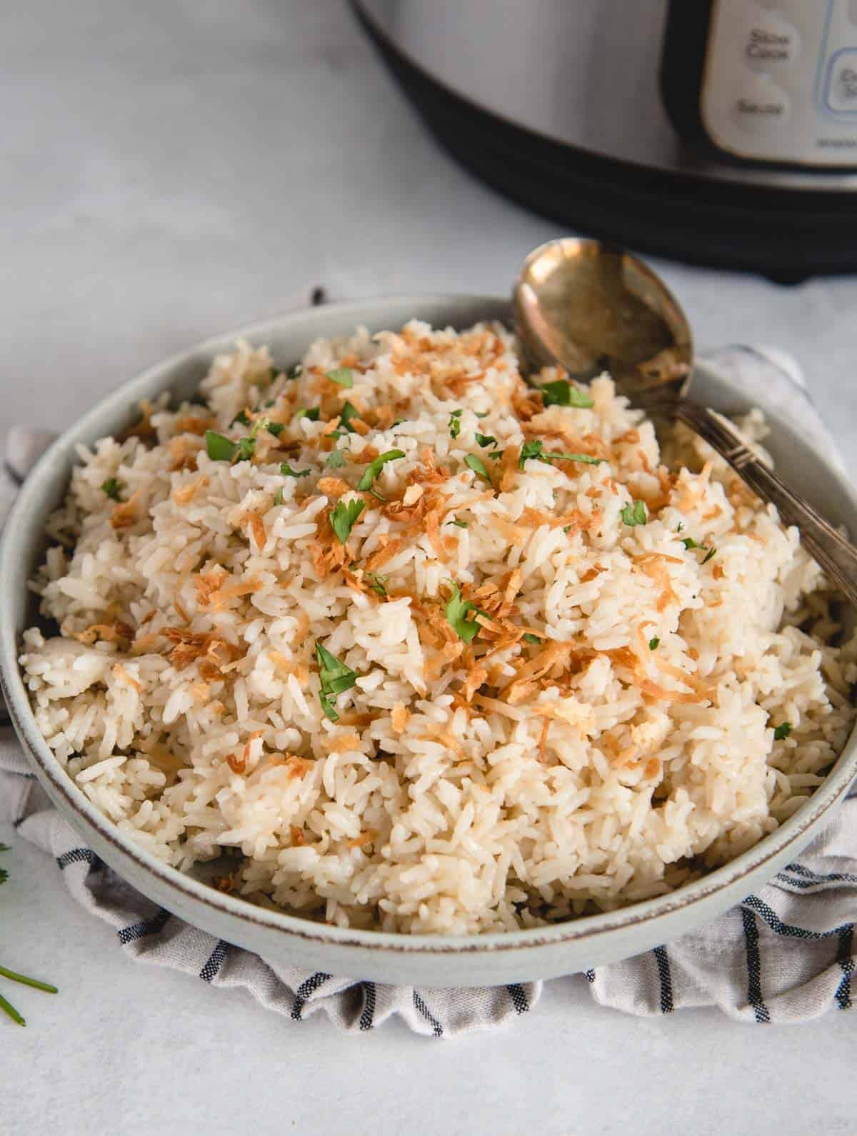 side view of coconut rice with instant pot in background