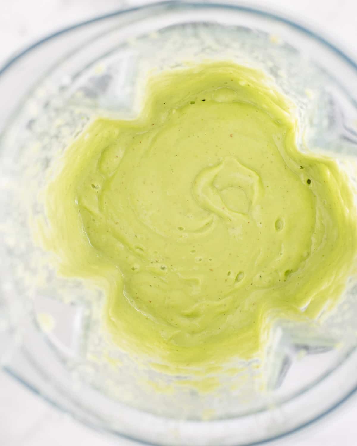 green smoothie in blender from overhead angle