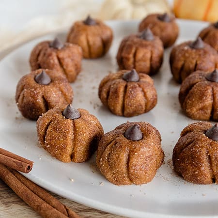 wide view of pumpkin protein balls on a plate